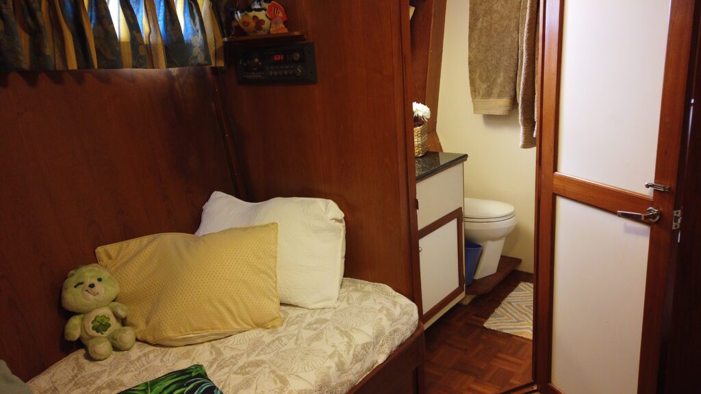 Inside image of a ship with a bed