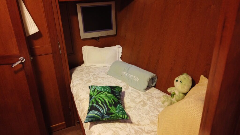 Inside mage of a ship bed with a soft toy