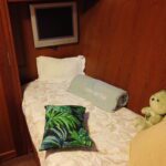 Inside mage of a ship bed with a soft toy